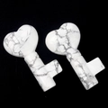 Set of two heart-shaped white howlite stone key carvings with natural grey marble veining - Howlite