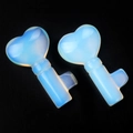 Pair of opalite heart-shaped crystal keys with translucent milky white and light blue glow - Opal (Synthetic)