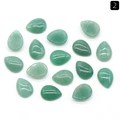 Flat lay of 12x16mm pear-shaped green aventurine quartz cabochons for DIY jewelry - 12x16mm / Green Aventurine