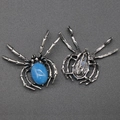 Spilla ragno in argento vintage con pietra blu, vista frontale e posteriore dettagliata - Agata blu