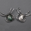 Gothic spider brooch pendant in antique silver with green gemstone inlay, front and back view - India Agate