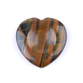 Polished heart-shaped tiger eye palm stone with natural golden brown stripes - Tiger Eye Thumb Stone