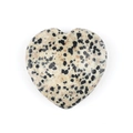 Natural Dalmatian Jasper heart shaped thumb stone with black spots on beige surface - Dalmatian Jasper Stone