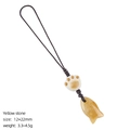 Cute yellow stone fish pendant with cat paw charm and dark brown braided cord - Yellow Jade Fish Pendant