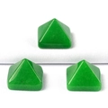 Three polished green aventurine pyramid gemstones on white textured cotton fabric - 14mm / Malay Jade (Dyed)