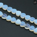Heart-shaped opal glass beads for DIY jewelry making with luminous pale blue sheen - Opal (Synthetic)