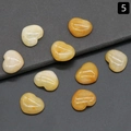 Pietra di quarzo citrino giallo lucido a forma di cuore con superficie a cabochon - Giada Gialla