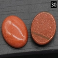 Set van twee ovale oranje goudsteen cabochons voor het maken van eigen sieraden - Goudsteen (Synthetisch) / 18x25mm
