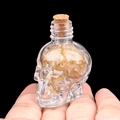 Flacon tête de mort en verre rempli de cristaux de quartz jaune naturel décoratifs - Citrine