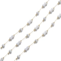 Detail of 18k gold chain with elegant white dumbbell and round shaped shell beads - Bone