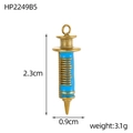 Detailed view of a mini syringe pendant with blue enamel and gold finish, size 2.3x0.9cm - Bright Blue Syringe (HP2249B5)