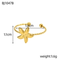 Dettaglio dell'anello a stella marina dorata con texture e misure della fascia a corda - Anello Aperto Stella Marina Oro (BJ1047B)