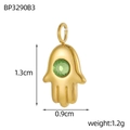 Detailed view of a gold Hamsa Hand pendant with a green crystal, measuring 1.3cm by 0.9cm - Green Zirconia Gold Hamsa Hand Pendant (BP3290B3)