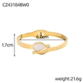 Detail view of a gold snake-shaped spring bracelet with shell inlay and size markings - Snake Curve Artificial Pearl Round Rhinestone Style (CZ43184BW0)