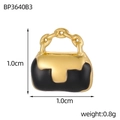 Detailed view of a mini 1.0cm x 1.0cm golden bag pendant with black enamel finish - Black Handbag Style (BP3640B3)