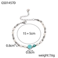 Detalle de pulsera de cuentas con dije de cara sonriente verde y acero inoxidable - Perla Cara Sonriente Bambú Metálico (GS01457D)