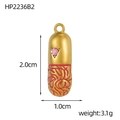 Macro view of gold capsule pendant with pink rhinestone and red enamel pattern - Pink Triangle Gem Red Texture Capsule (HP2236B2)
