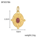 Macro detail of oval gold sunburst pendant with red stone, 2.2cm height and 1.8cm width - Oval Red Gemstone Starry(BP3057B6)