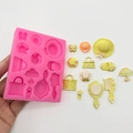 Pink silicone mold featuring miniature hats, bags and shoes for cake decorating - Pink