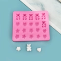 Molde de silicona rosa con formas de oso, corazón y estrella con muestras terminadas - Estilo Combo (3504-Rosa)