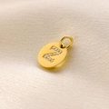 14K gold plated round disc pendant featuring diamond-set letter Z and a top loop - Letter Z