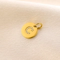 Fashionable 14K gold circular pendant featuring diamond-encrusted letter C design - Letter C