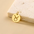 Golden stainless steel Taurus zodiac pendant with hollow round design for DIY jewelry - Taurus - Gold