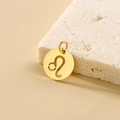 Golden stainless steel Leo zodiac pendant with hollow round charm on white stone - Leo - Gold