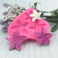 Pink silicone plumeria flower mold for chocolate fondant with three sizes of blossoms - 3 Flower Cavities (QH6501)