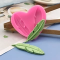 Herzförmige Silikonform in Rosa für Feder-Motive beim Backen und Kuchendekorationen - Rosa