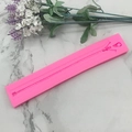 Silikonform mit Reißverschlussmuster für Tortendeko und Schokoladenumrandungen - Rosa