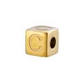 Macro shot of 14K gold plated cube bead with engraved letter C for DIY jewelry making - Gold C