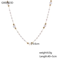 Detail of 18k gold chain featuring faceted iridescent beads and small gold accents - Iridescent Crystal Beaded Style (GX00923D)