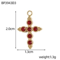 Macro shot of 18k gold plated cross pendant with red crystals and dimension markings - Rhinestone Cross Style - Red Rhinestone (BP3943D3)