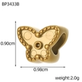 Détail macro d'une perle papillon dorée de 0,98x0,90 cm pour la création de bijoux DIY - Forme de Noeud (BP3433B)