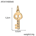 Macro detail of a 1.2cm gold skull key pendant with four small white zircons - Skull Key Style (AP34194D0W0)