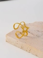 Detail of a gold plated adjustable ring with hollow star design and beaded band texture - Hollow Star Style (36170)