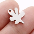 Irregular silver leaf pendant in stainless steel held on a fingertip for size scale - Abstract Organic Shape (DY763-1)