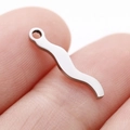Silver stainless steel S-curve wave pendant jewelry making charm shown on fingertip - S-Shaped Curve (DY767-1)
