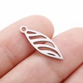 Silver hollow leaf pendant in stainless steel held between fingers for size reference - Steel Color Willow Leaf (DY758-1)