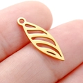 Golden hollow leaf charm earring pendant in stainless steel held on a fingertip - Gold Color Willow Leaf (DY758-2)