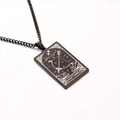 Black Sagittarius tarot card necklace pendant with detailed bow and arrow engraving - Sagittarius / Black