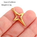 Goldener hohler Sternanhänger 17x28mm für DIY-Schmuckherstellung auf einer Hand gezeigt - Kreuzstern-Stil (DY1094-2) Gold