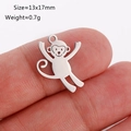 Polished silver stainless steel monkey pendant 13x17mm on finger for size reference - Monkey Shape (DY1134-1 Steel Color)