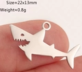 Shark shaped stainless steel pendant with hollow design, size 22x13mm weight 0.8g - Silver Shark (DY1287-1)
