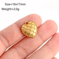 Golden heart-shaped pendant with fish scale texture held by fingers for scale - Heart Fish Scale Pattern (DY1086-2)