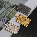 Pendentif tarot Roue de la Fortune vintage en acier noir, doré et argenté - La Roue de Fortune