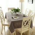 Nordic minimalist striped linen tablecloth with decorative tassels on a dining table - 140x200cm / Coffee White Stripes