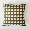 Detail of Nordic style green cushion cover featuring a white hedgehog pattern and fabric texture - Hedgehog