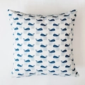 Close-up of Nordic style square pillowcase with blue whale print on textured cotton linen - Blue Whale
